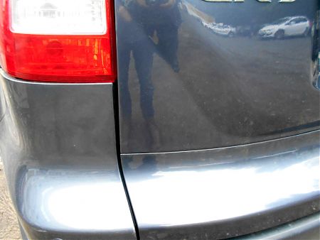 Угол крышки багажника Honda CR-V после покраски